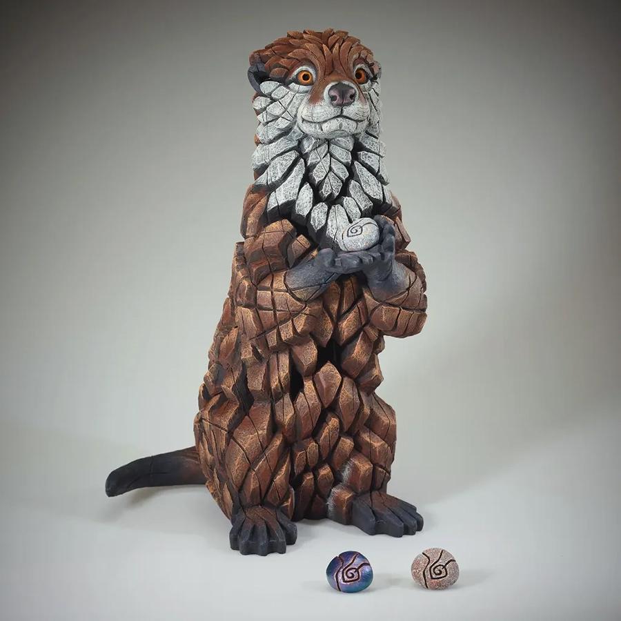 Otter Sculpture With Pebbles
